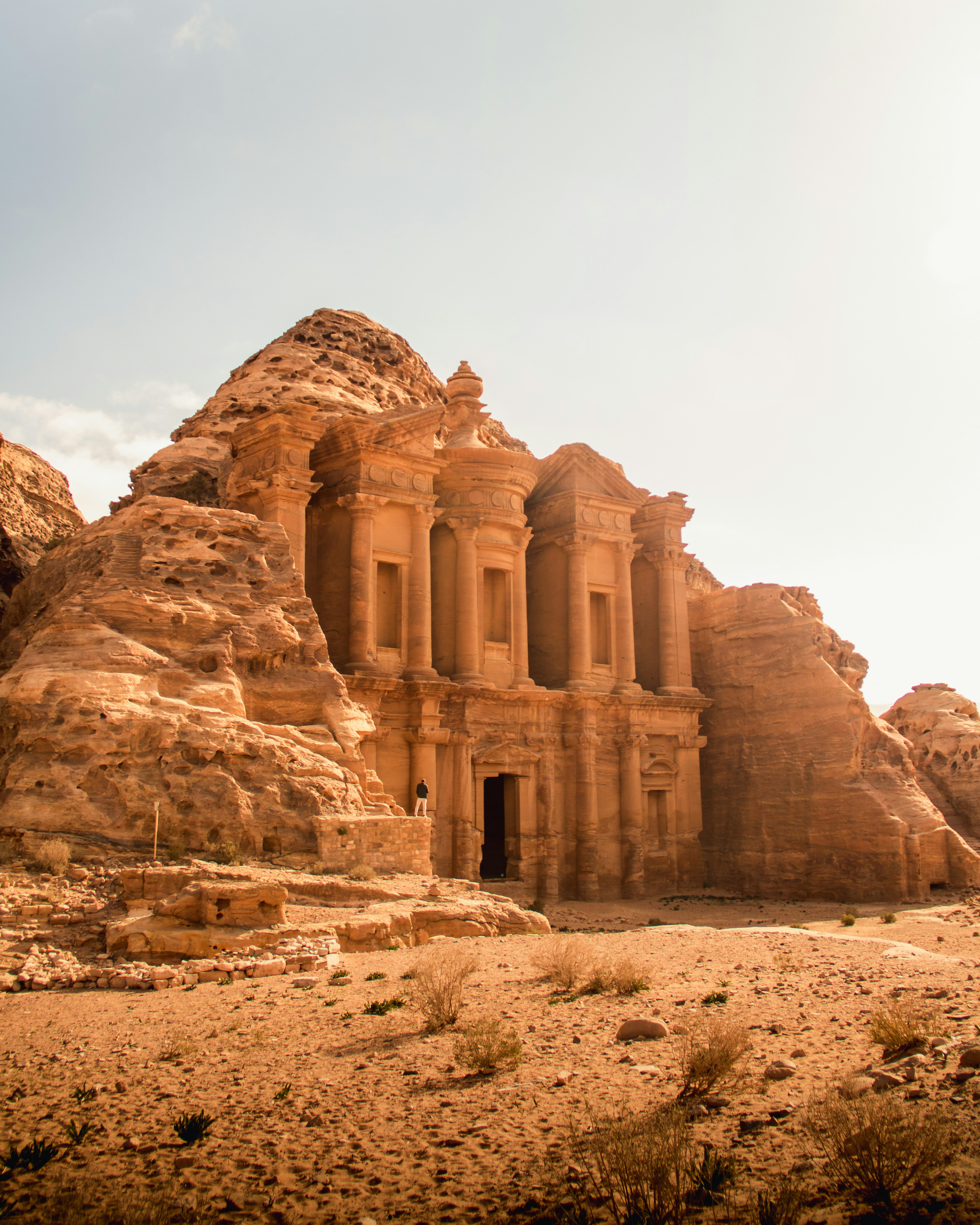 Petra Treasury carved into rose-red sandstone cliffs in Jordan