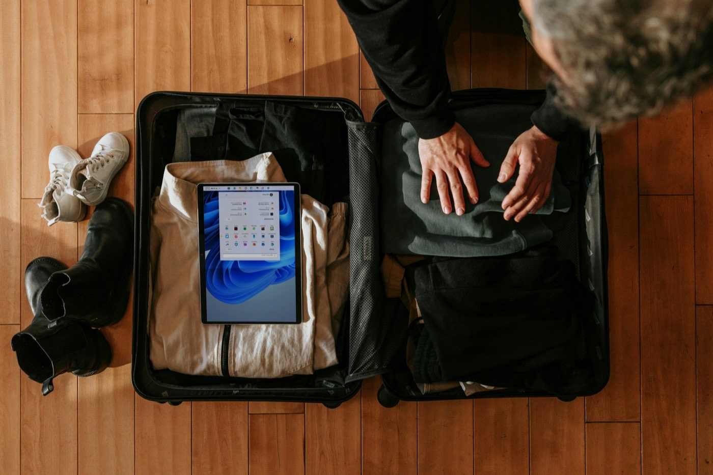 A traveller with a smartphone navigating the ancient city of Petra, Jordan