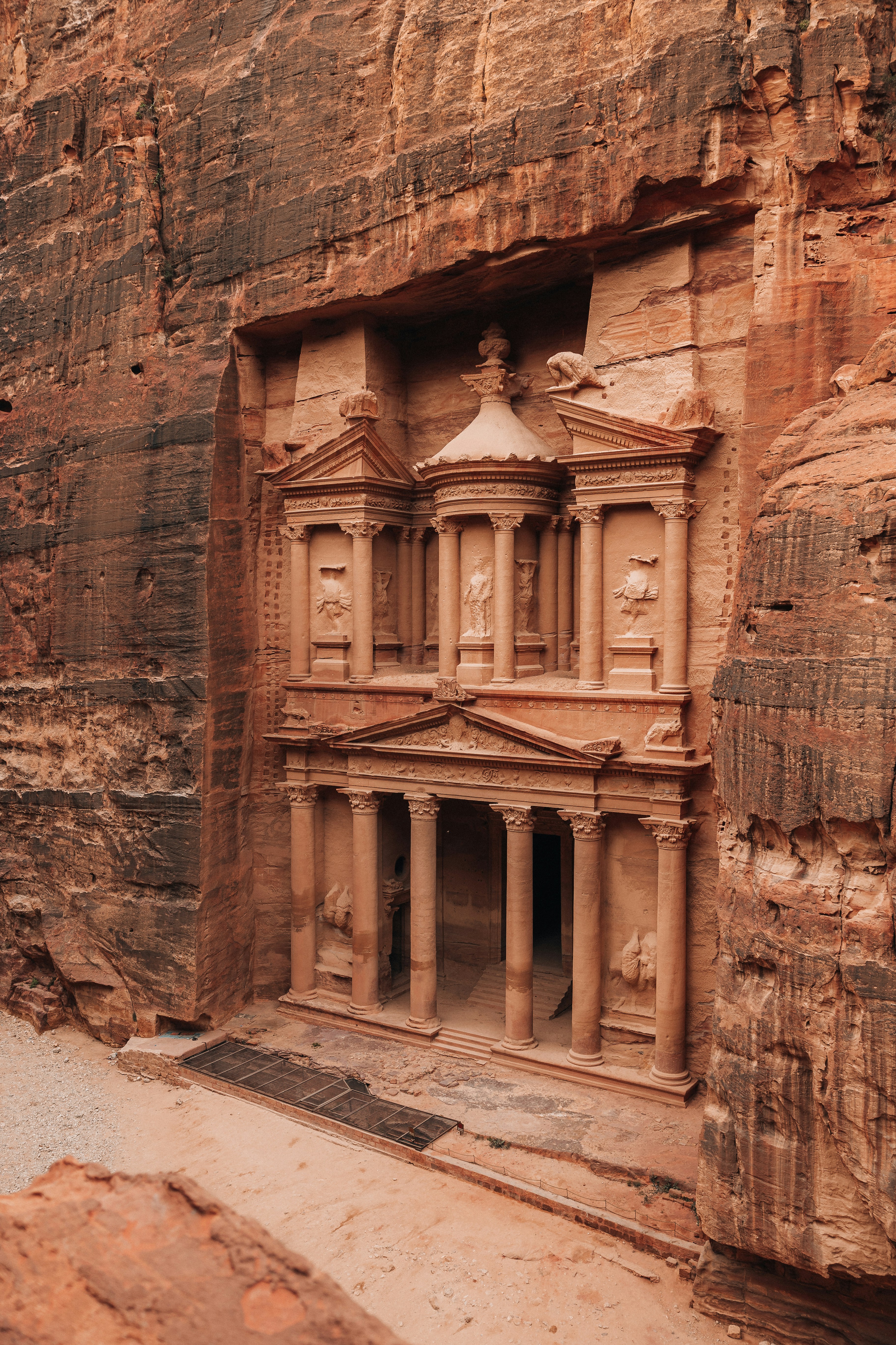 Cliff-carved Nabataean facade in the rose-red sandstone of Petra, Jordan
