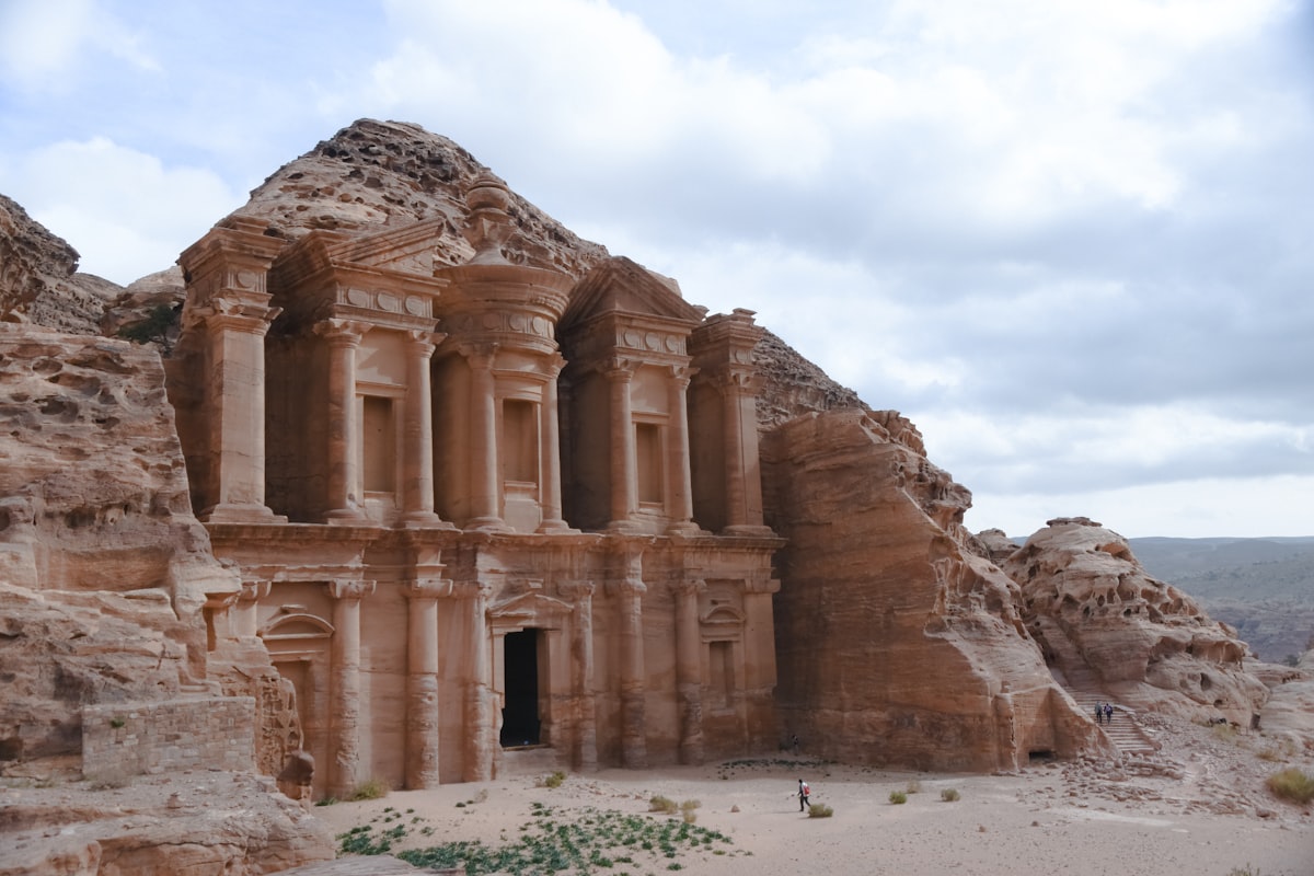 The Monastery carved into rose-red sandstone cliffs in Petra, Jordan