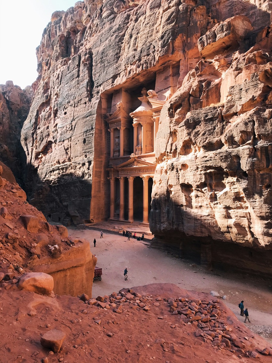 The Treasury at Petra seen through the narrow Siq canyon passage, Jordan